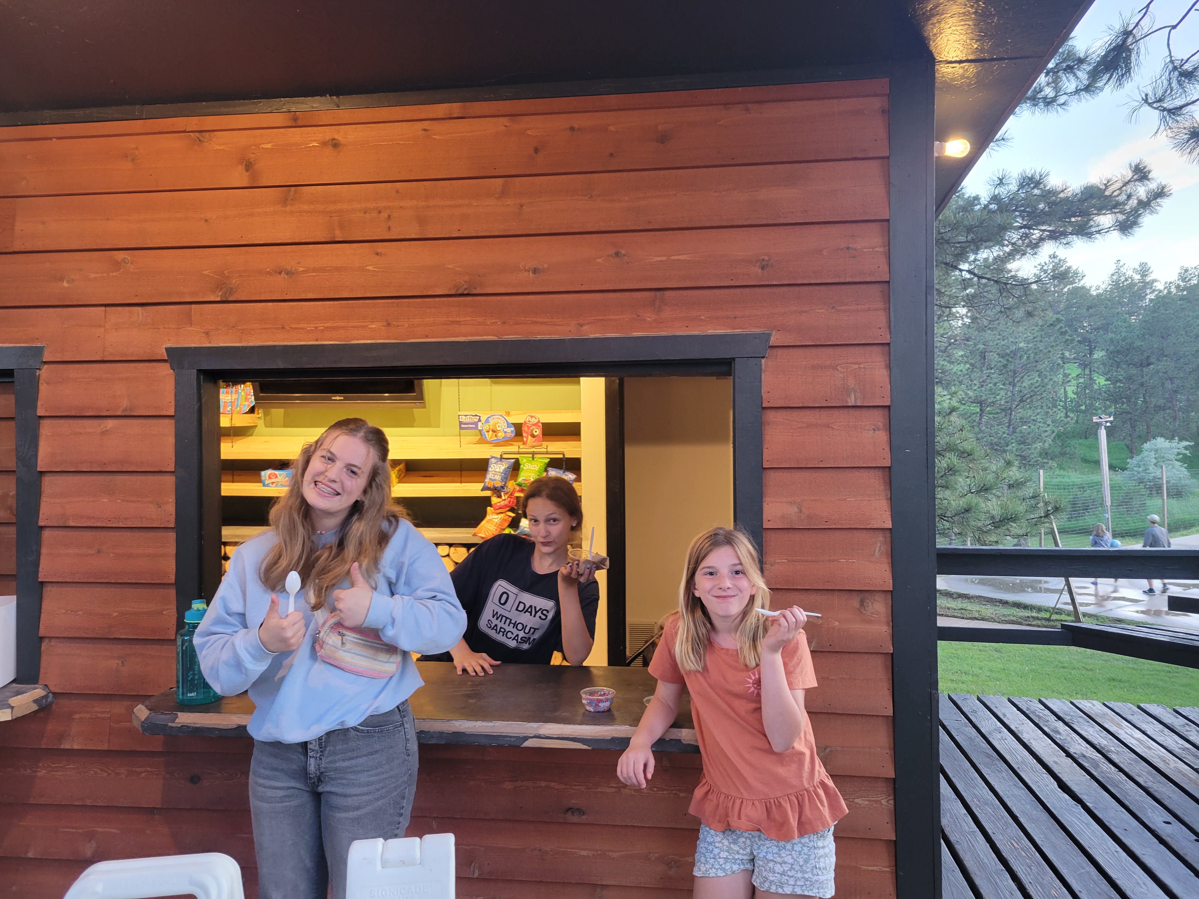 Girls in front of snack shop.jpg